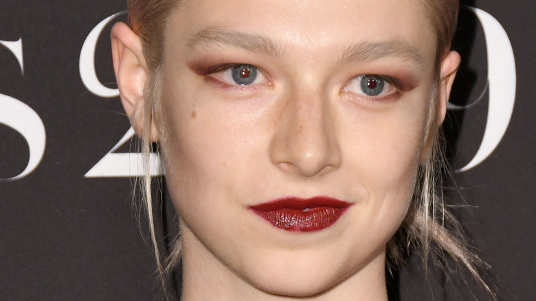 Hunter Schafer wears red lipstick