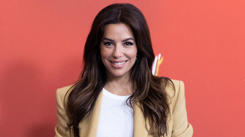 Eva Longoria smiling red carpet 