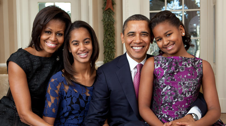 Michelle, Malia, Barack, and Sasha Obama pose for photo in White House