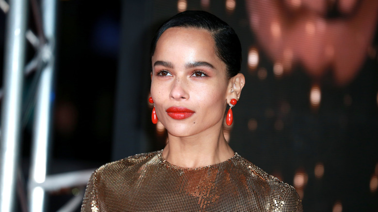 zoe kravitz red earrings looking up