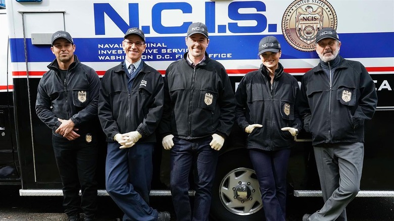NCIS cast members in police gear