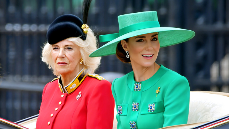 Princess Catherine and Queen Camilla riding in carriage in 2023