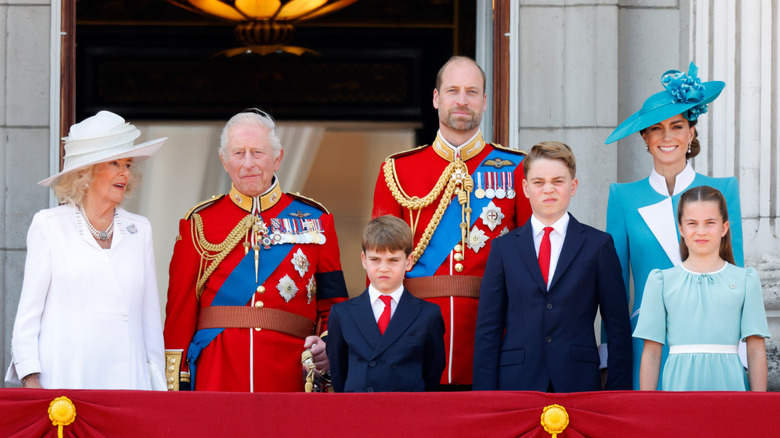 The royal family posing together on a balcony