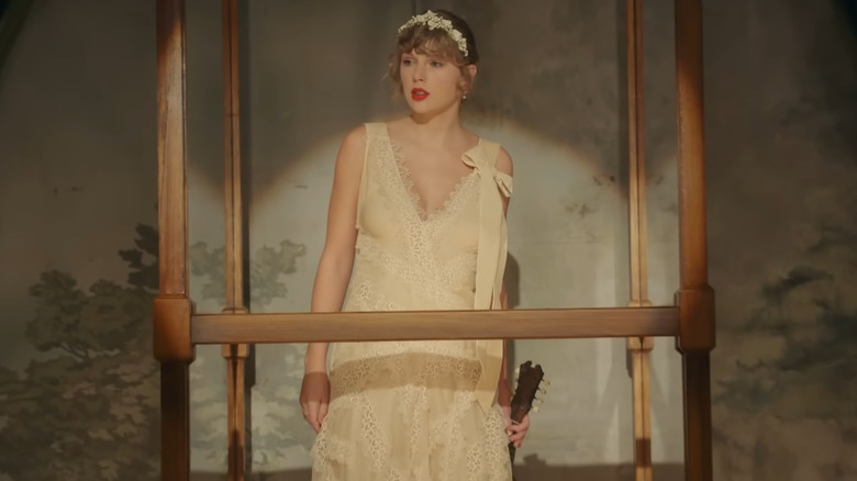 Taylor Swift in white dress in Willow music video