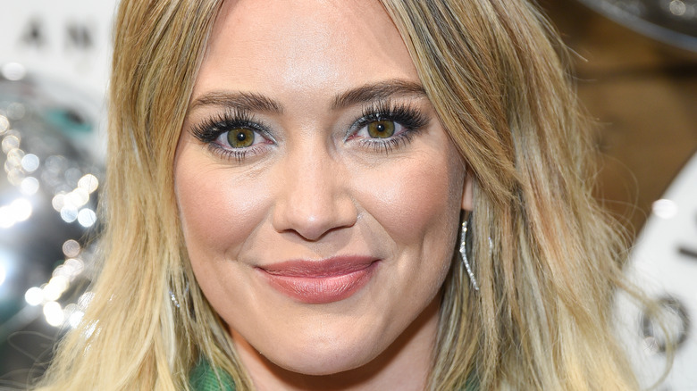 Hilary Duff smiling on the red carpet