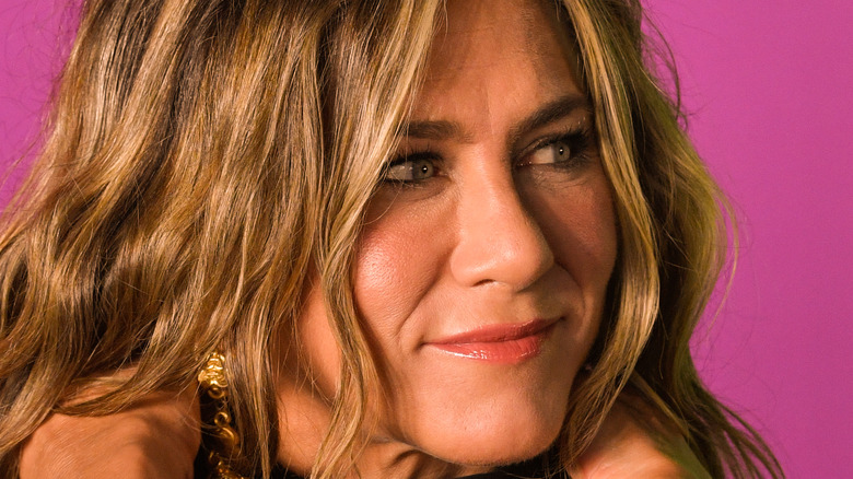 jennifer aniston hot pink backdrop