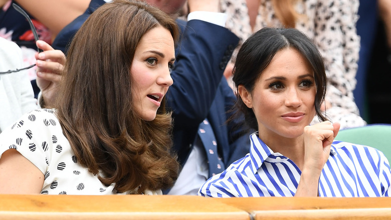 Kate Middleton and Meghan Markle watching tennis