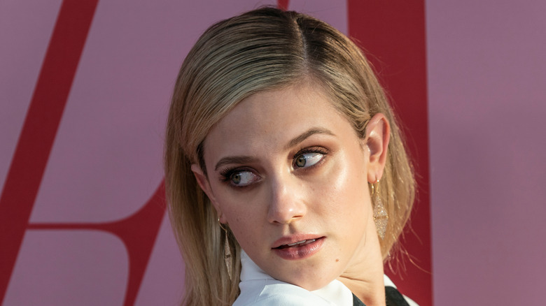 Lili Reinhart looking over shoulder
