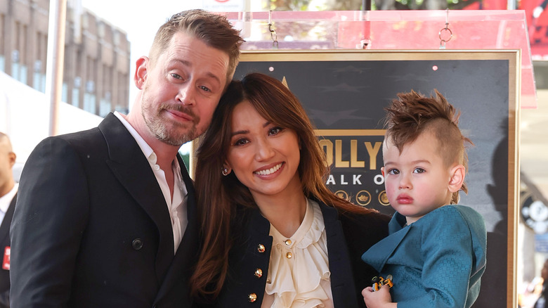 Macaulay Culkin and Brenda Song with their son