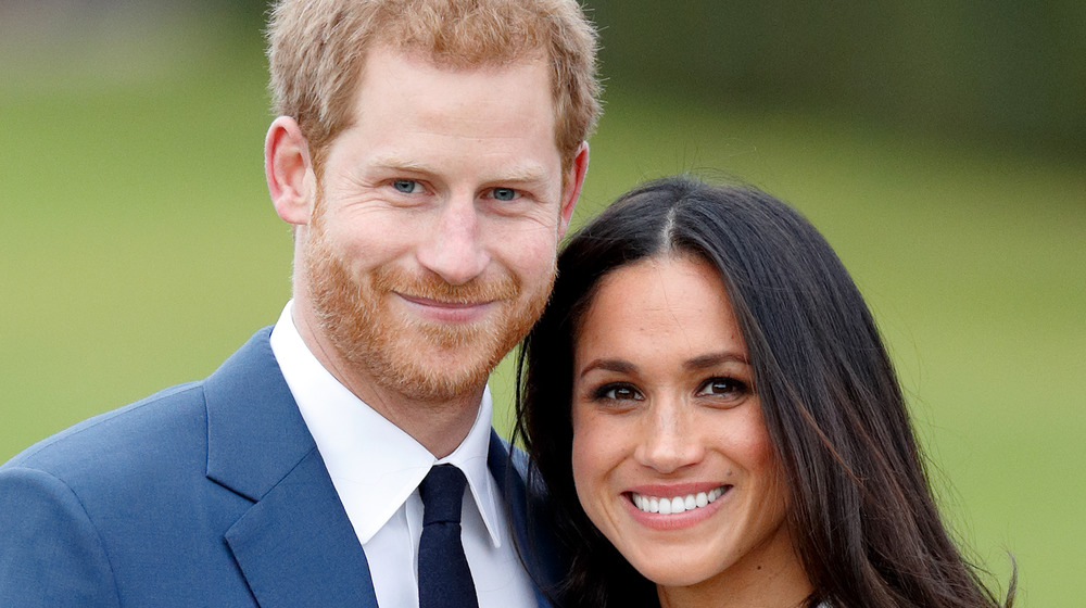 Prince Harry and Meghan Markle smile