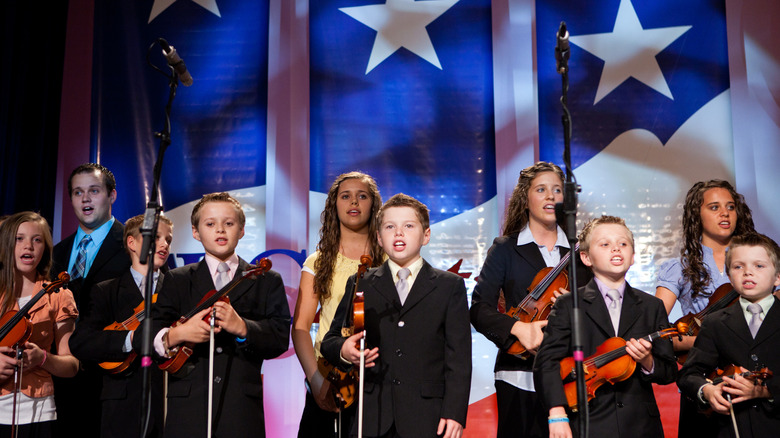 The Duggar children put on a musical performance