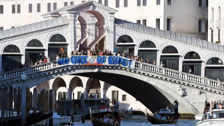 No Space for Bezos sign hung off the Rialto Bridge in Venice during Jeff Bezos and Lauren Sanchez wedding