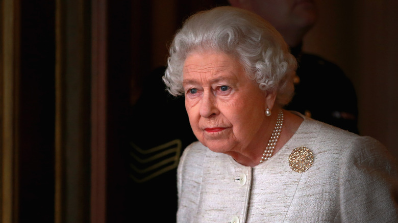 Queen Elizabeth softly gazing outward