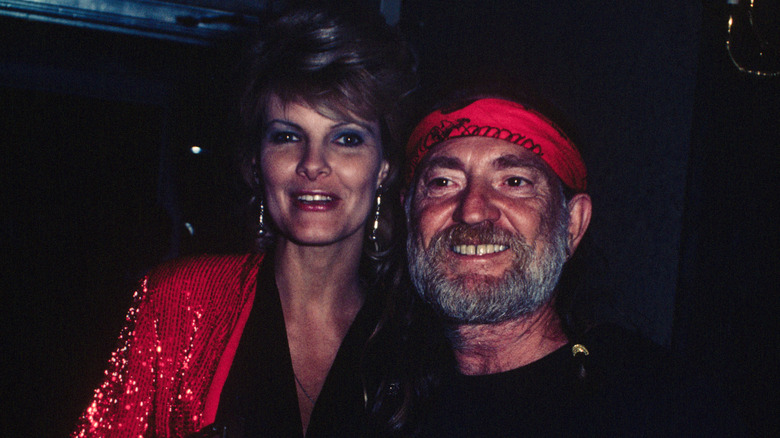 Connie Koepke and Willie Nelson smiling together