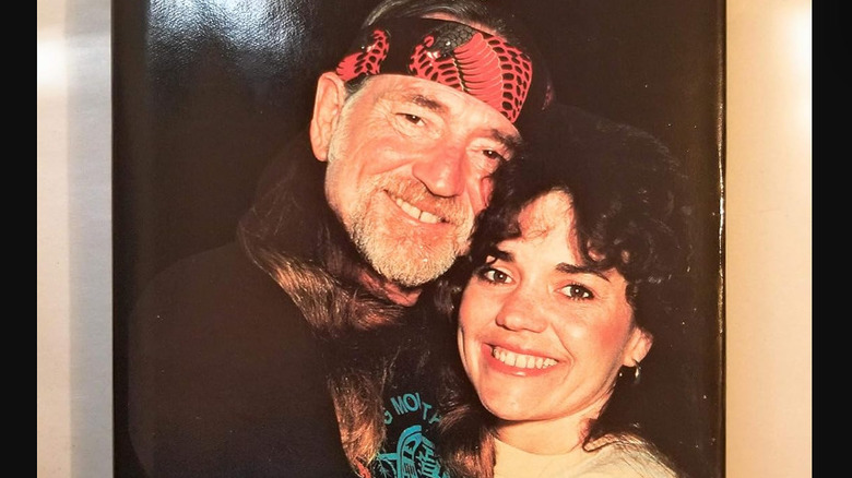 Willie Nelson smiling with Susie Nelson on the cover of Heart Worn Memories: A Daughter's Personal Biography of Willie Nelson
