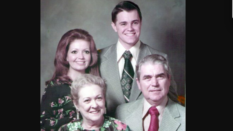 Renee Butts, her brother, Kevan, her mother, Mary Haney, and her stepfather posing for a family photo