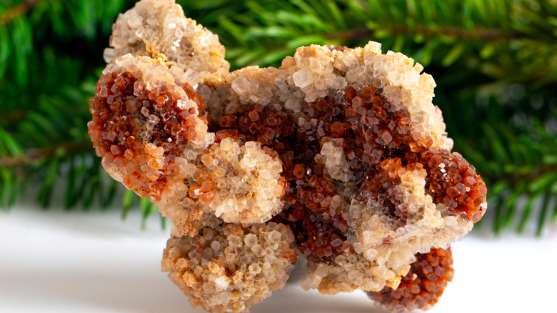 A reddish brown aragonite mineral