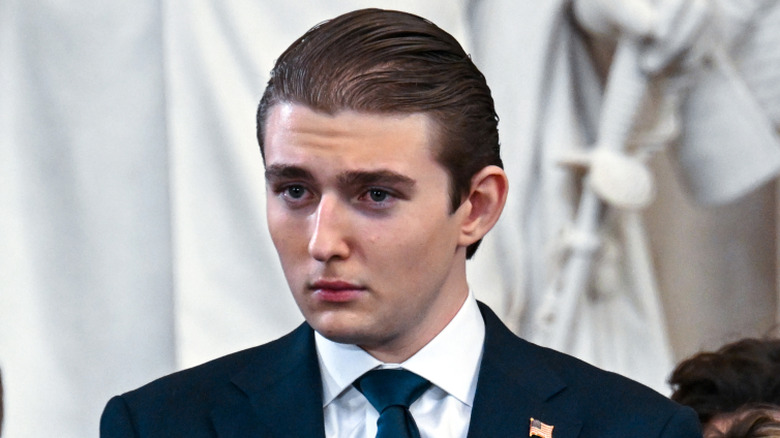 Barron Trump close-up while he's staring to the side
