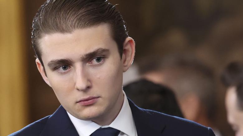 Barron Trump close-up with head tilted