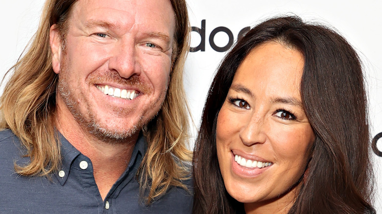 Chip and Joanna Gaines smiling at an event 