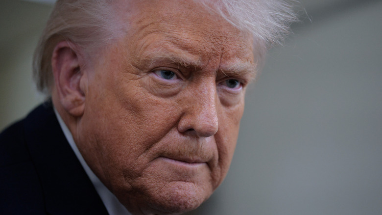 Donald Trump pursing his lips