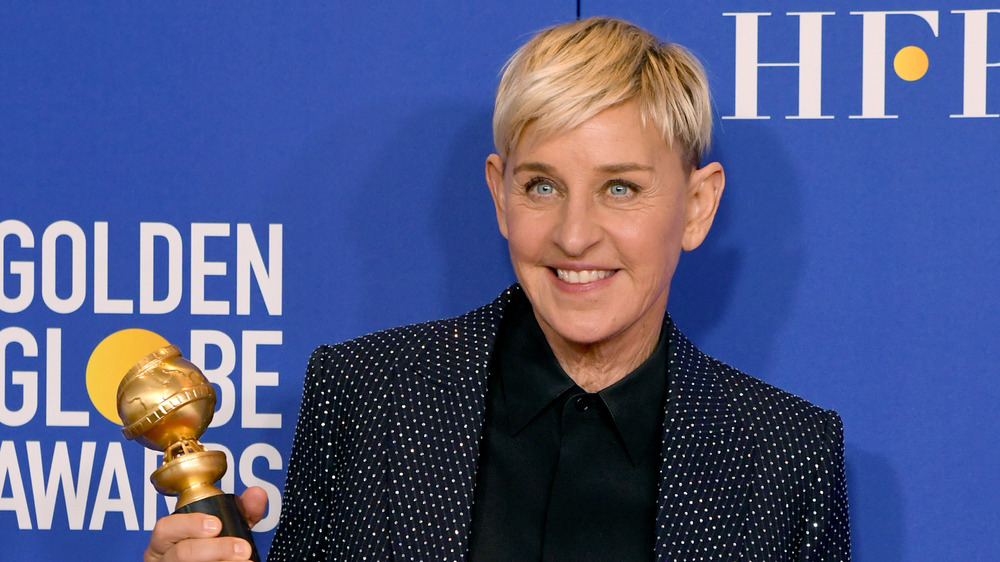 Ellen DeGeneres holding Golden Globe Award