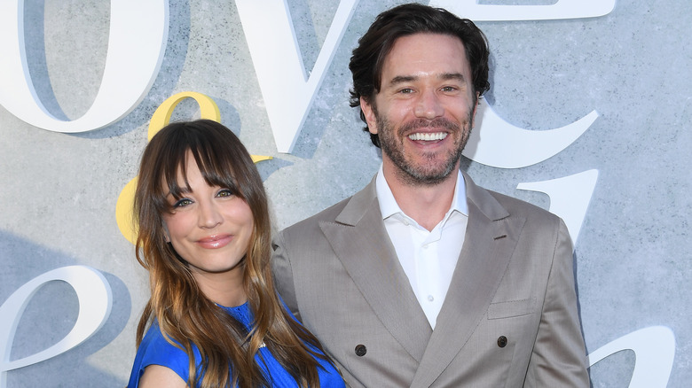 Kaley Cuoco and Tom Pelphrey smiling 