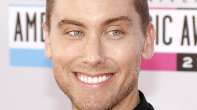 Lance Bass smiling on red carpet