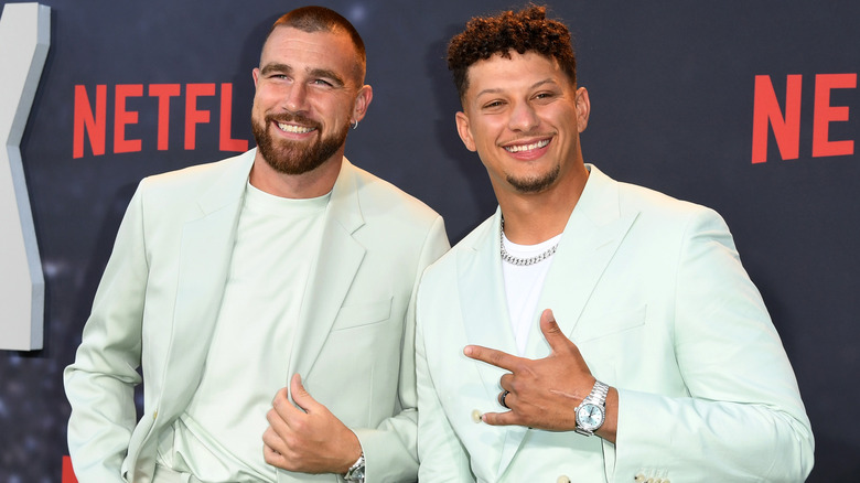 Travis Kelce and Patrick Mahomes posing