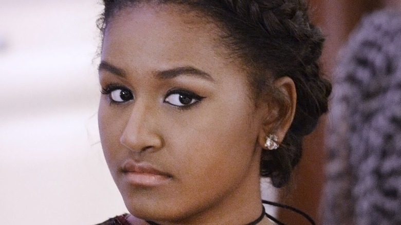 Sasha Obama with serious expression