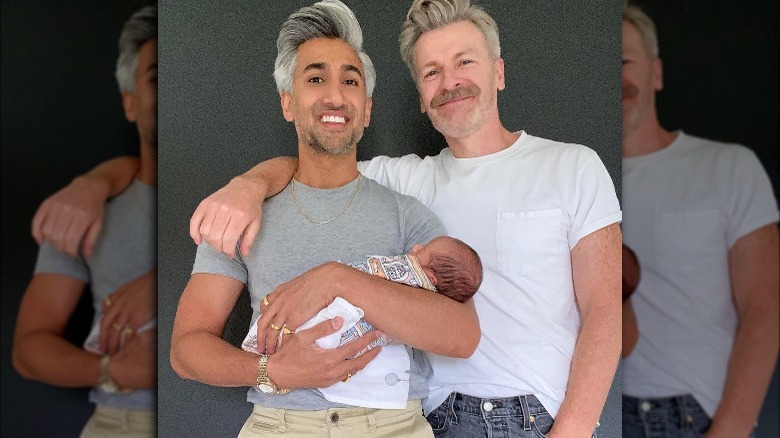Tan France with husband Rob and baby