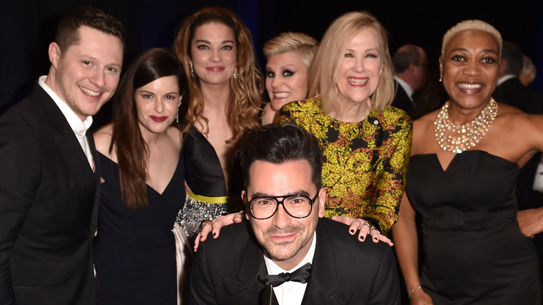 The 'Schitt's Creek' cast poses for a photo