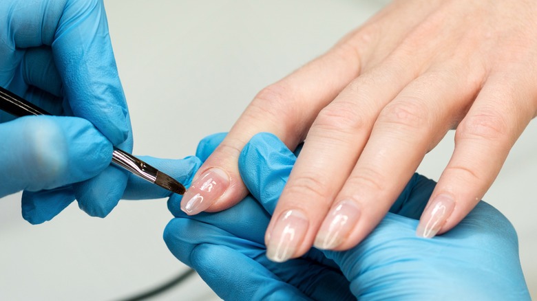 Gel manicure being applied