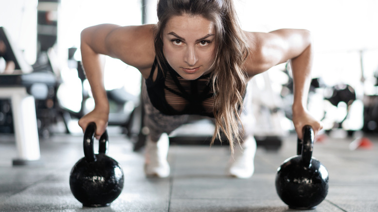 Fit woman doing push-ups