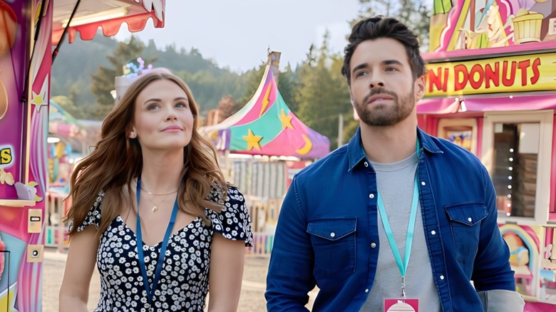Holland Roden and Corey Cott posing in character