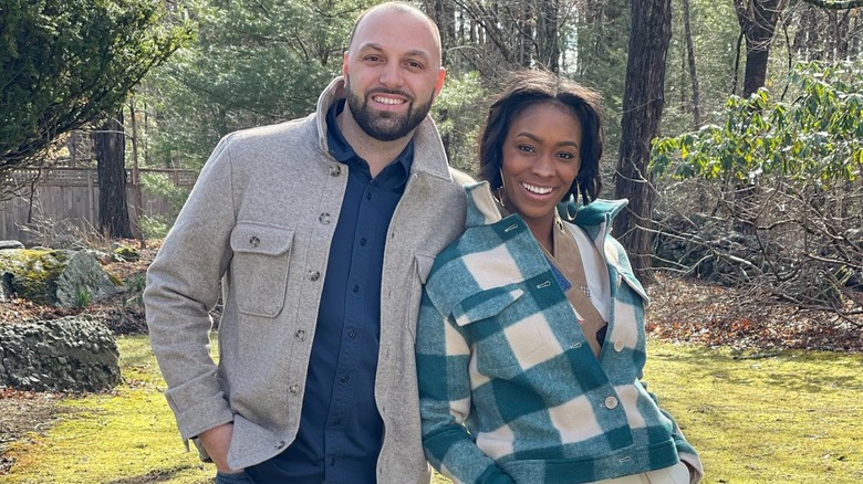 Mike and Denese Butler posing together in outdoor setting