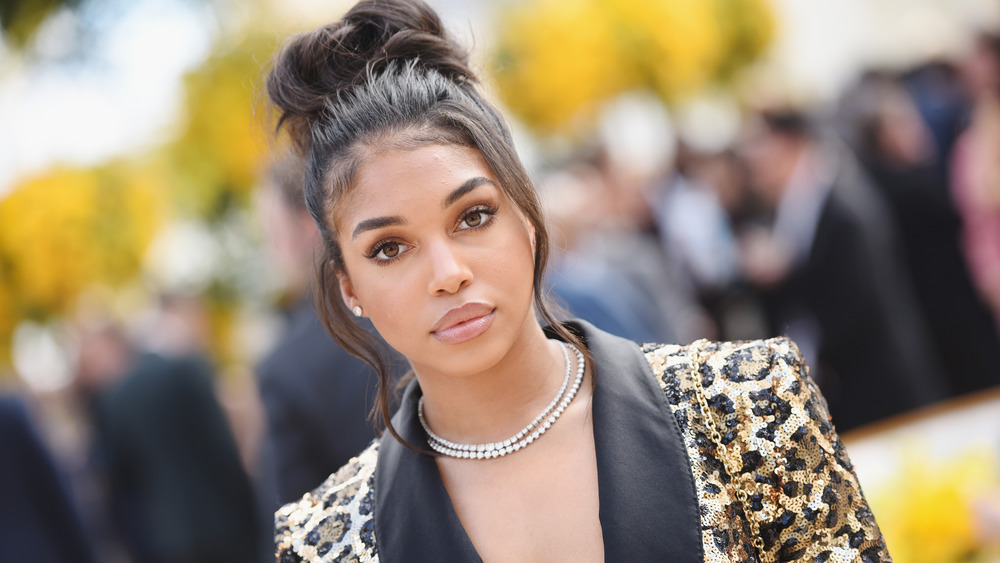 Lori Harvey wearing a sequined jacket