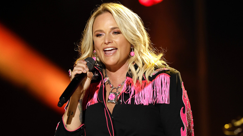 Miranda Lambert in pink performing