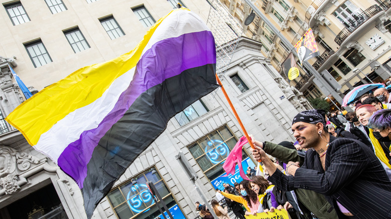 nonbinary activists waving 