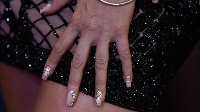 Close up of bedazzled nails 