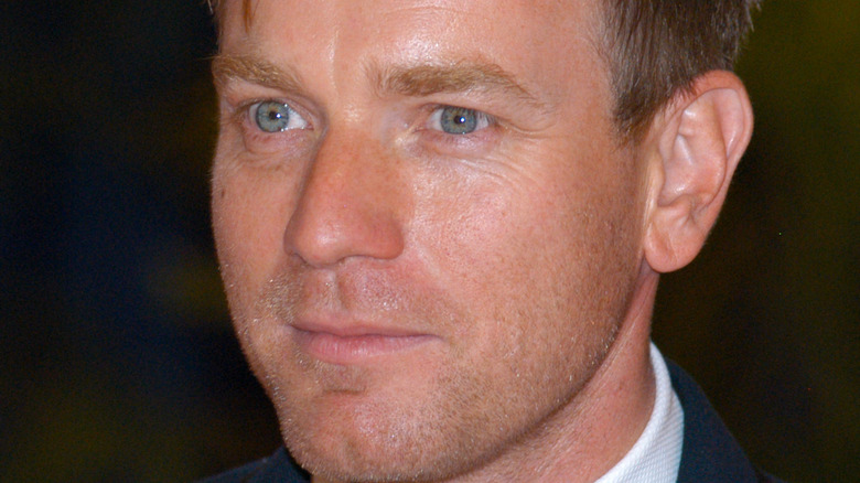 Ewan McGregor with slight grin and scruff