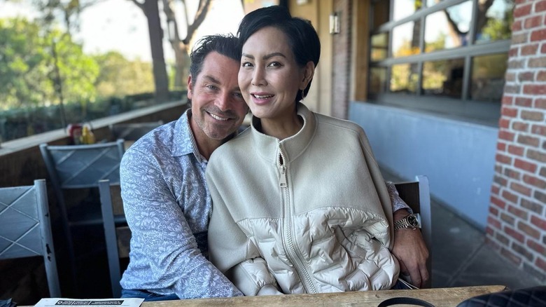 Brennan Elliott and Camilla Row smiling