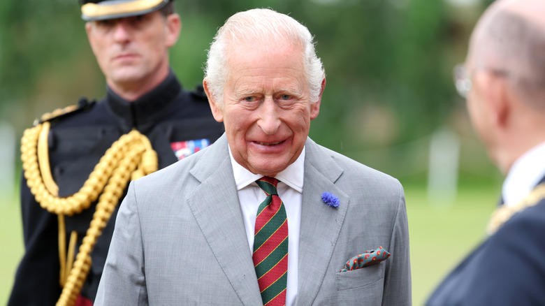 King Charles III smiling