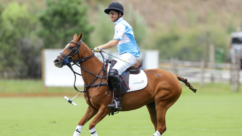 Prince Harry playing polo