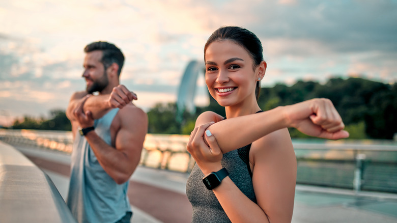 Runners stretching before a run