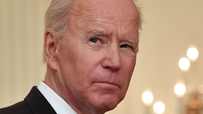 President Job Biden looks to the side