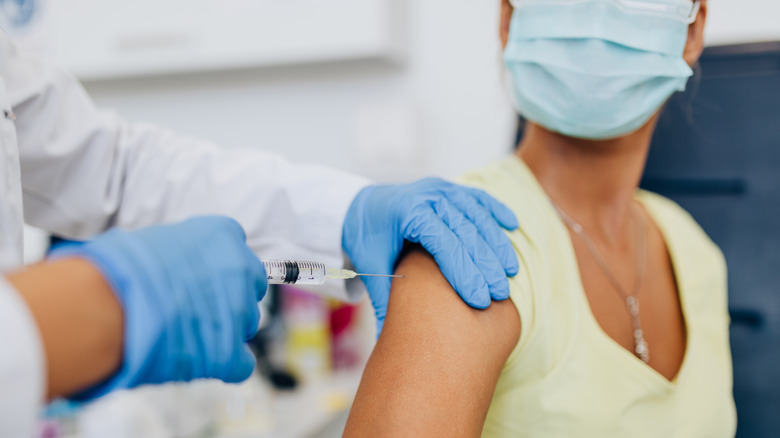 Woman getting flu shot