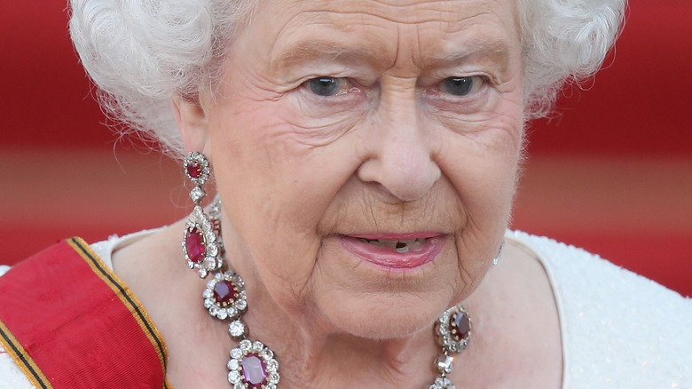 Queen Elizabeth wearing rubies and diamonds