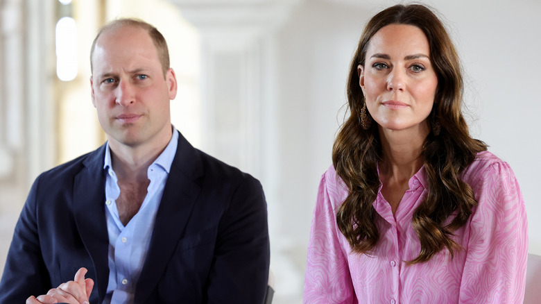 Prince William and Kate Middleton looking somber