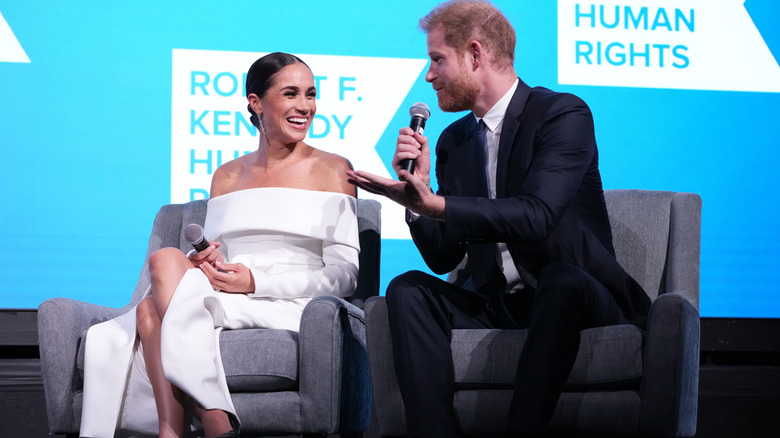 Prince Harry and Meghan Markle take the mic